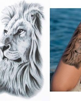 Tatuaż z lwem dumny na rękę udo